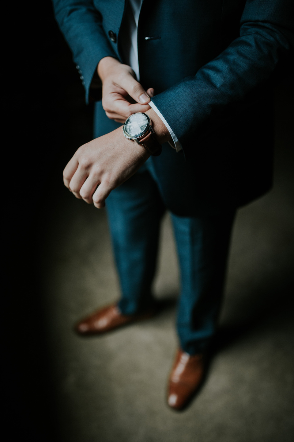 Businessman Fixing His Cuffs